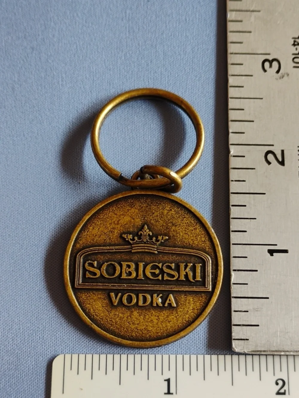 Fisher House Bronze Keychain — Helping Military Families Sobieski Vodka